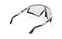 LENTE RUDY DEFENDER SAND MATTE IMPXCT2 LSRBK PHOTO