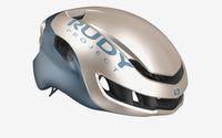 Casco de ciclismo Rudy Project Nytron champagne azul avio metal mate para ruta y competición